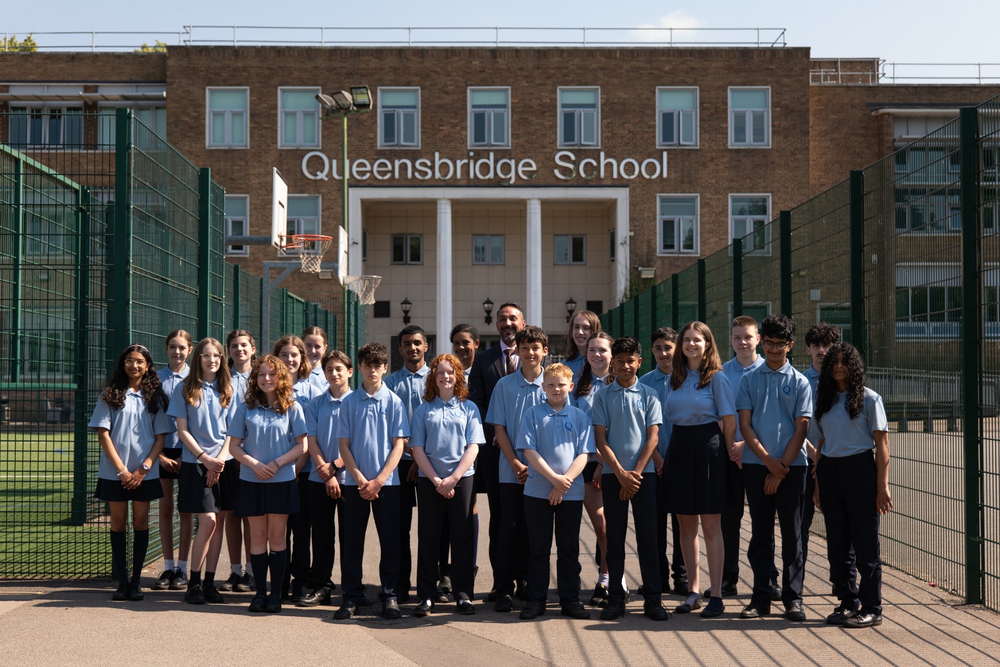 Headteacher and Queensbridge Schools student leaders